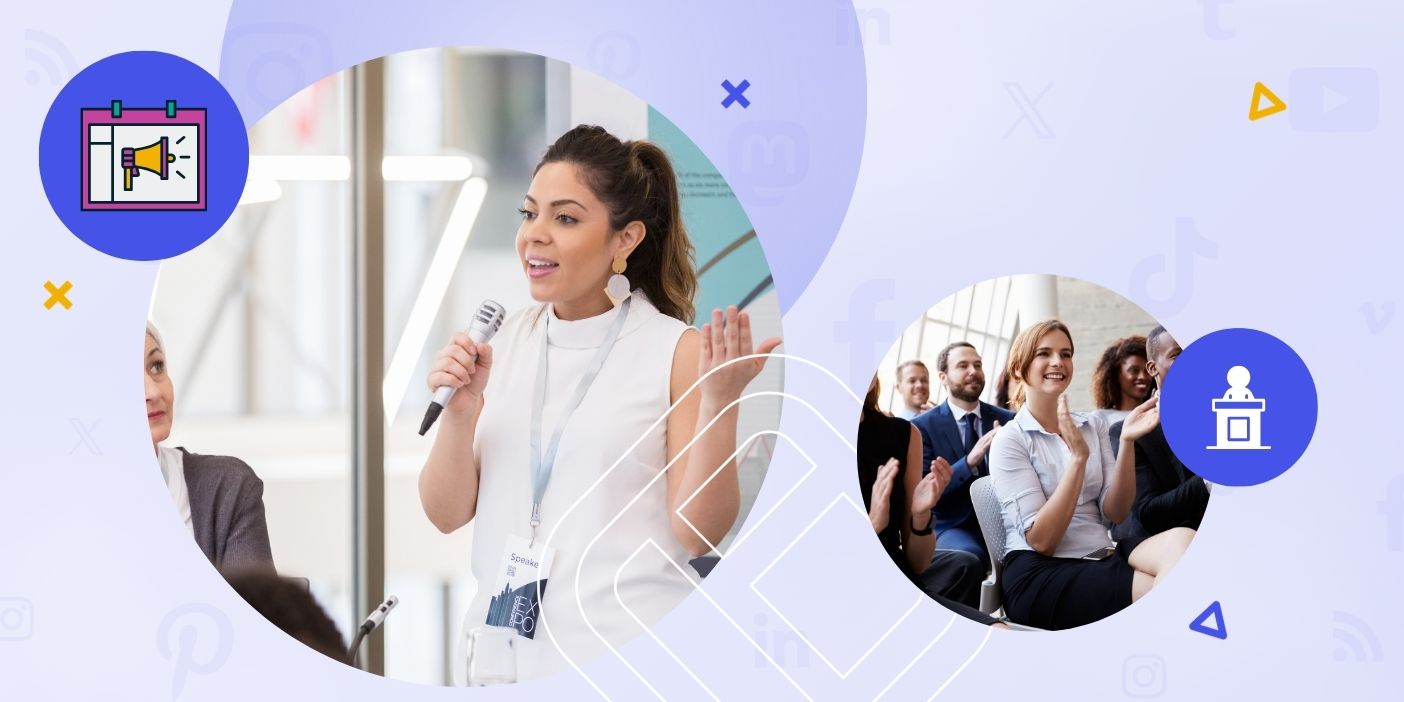 A speaker with a microphone, and an audience clapping.